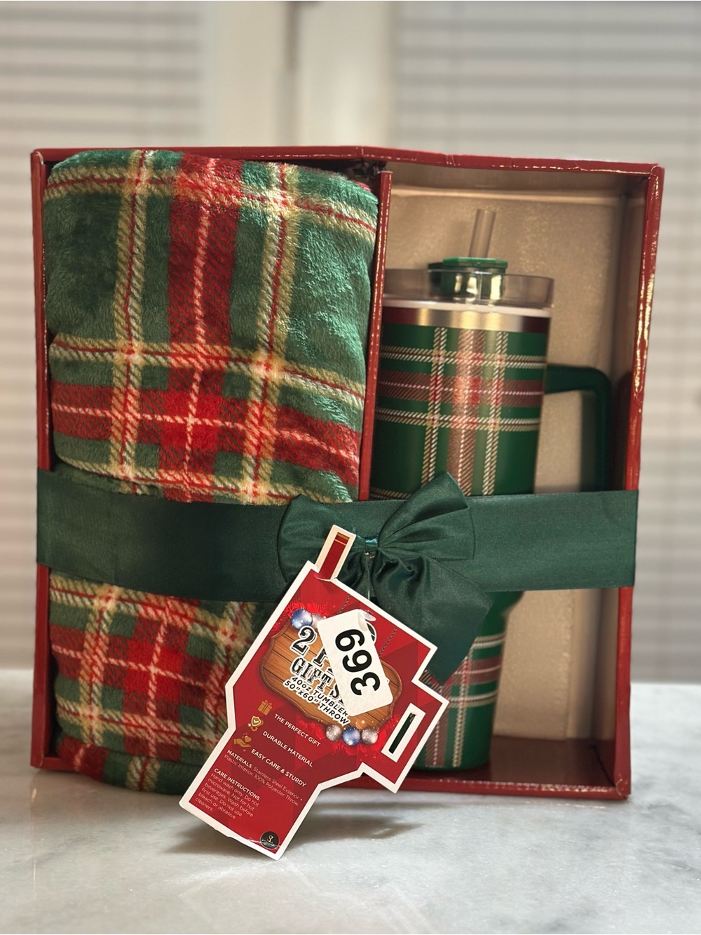 Festive Christmas plaid gift set. Featuring cozy blanket and Insulated Tumbler